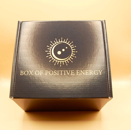 Black packaging for a positive energy box